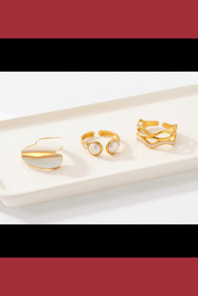 Trio painted  white and gold rings